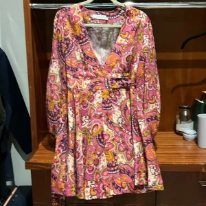 Couture linen bright print wrap dress with puff sleeves by Zimmerman