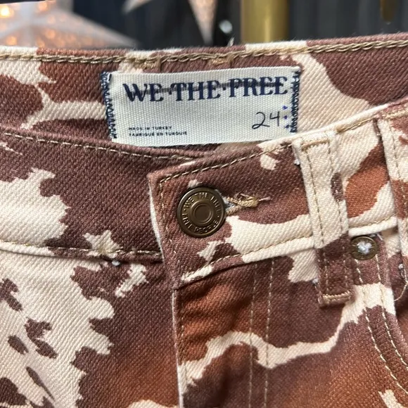 Free People Risk Taker Mid Rise Printed Jeans in Tea Combo-Cow Print