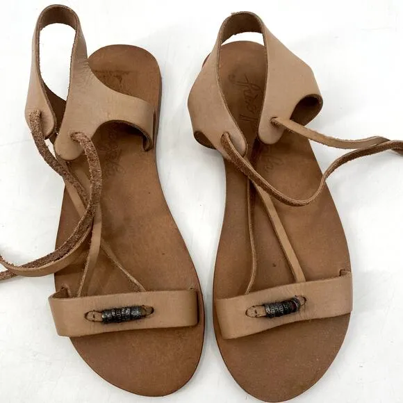 Free people tan gladiator Wrap Sandals