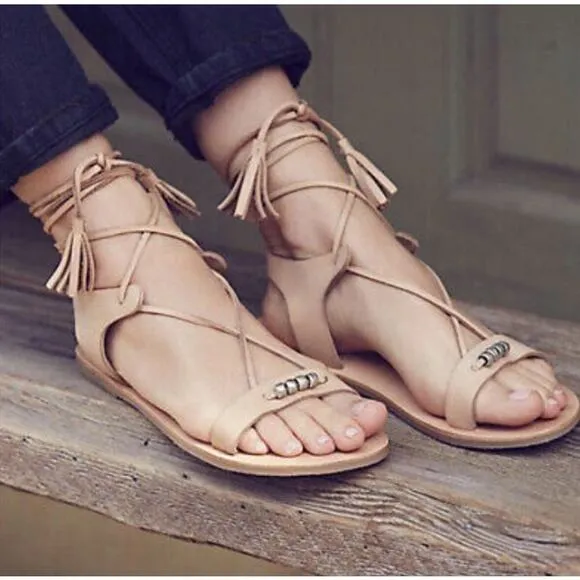 Free people tan gladiator Wrap Sandals