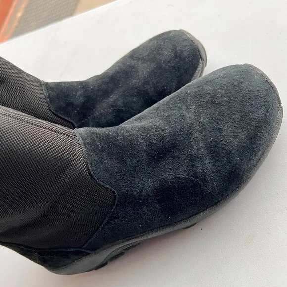 Merrell Jungle Mid Zip Polar Insulated Boots in black with Vibram Arctic Grip