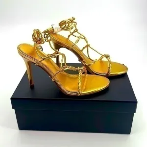 New in Box Marciano gold ankle wrap 4 in heel sandals size 6.5