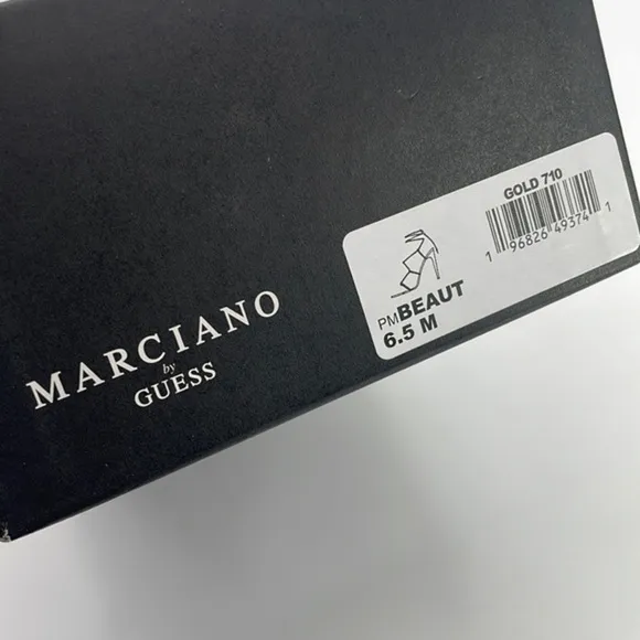 New in Box Marciano gold ankle wrap 4 in heel sandals size 6.5
