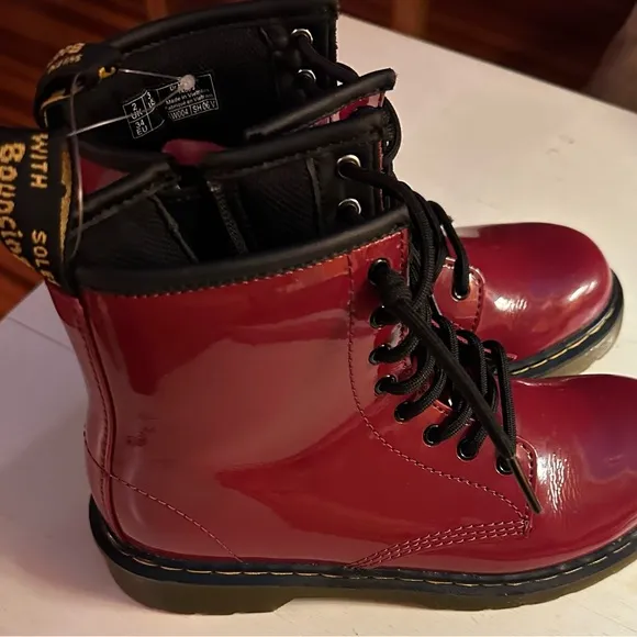 New unisex  red / burgundy Doc  martens boots.  New no box. Size 3 .