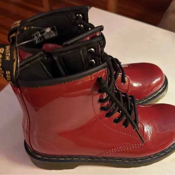 New unisex  red / burgundy Doc  martens boots.  New no box. Size 3 .