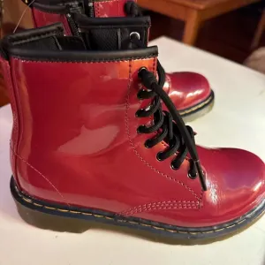 New unisex  red / burgundy Doc  martens boots.  New no box. Size 3 .