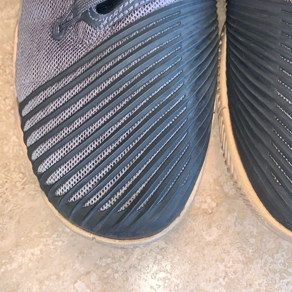 NIKE grey sneakers, grey/pale pink soles, breathable mesh, swoosh. 9.5 EUC
