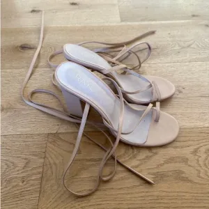 Raye - Toe Strap Wrap Around Heel Sandals in Nude