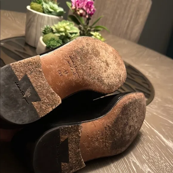 Salvatore Ferragamo Black and Gold Loafers with Horsebit Detail