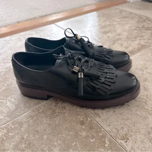 Tods Black Tassel leather Loafers