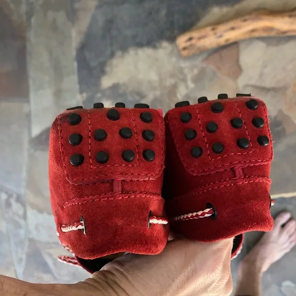 Tod’s red suede driving loafers