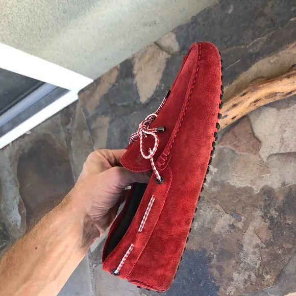 Tod’s red suede driving loafers