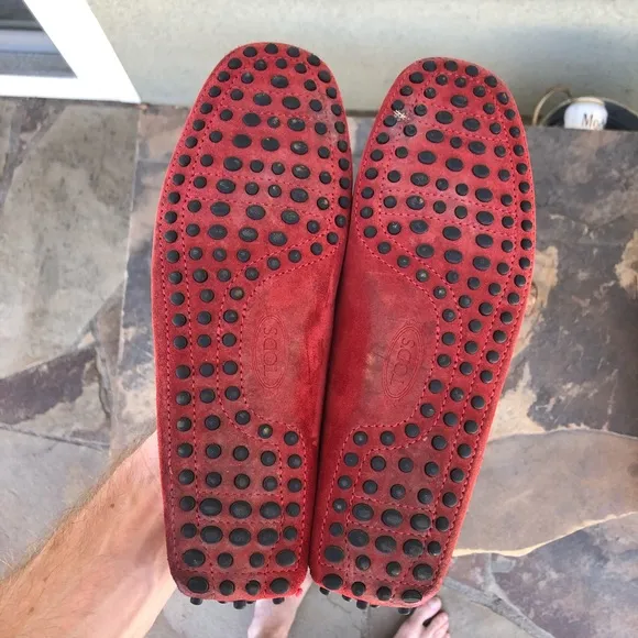 Tod’s red suede driving loafers