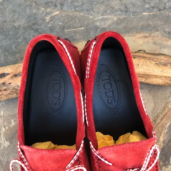Tod’s red suede driving loafers