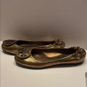 Tory Burch Gold Ballet Flats with Medallion