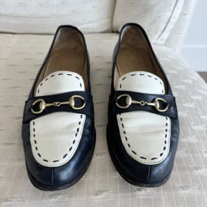 Vintage Gucci navy and white gold horsebit loafers