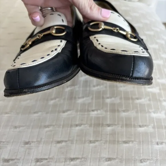 Vintage Gucci navy and white gold horsebit loafers