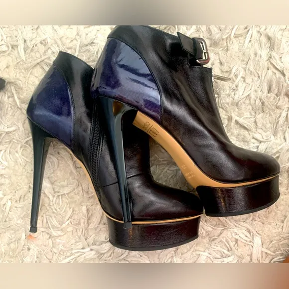 Wearing ones in perfect condition so sexy High heels-boots.