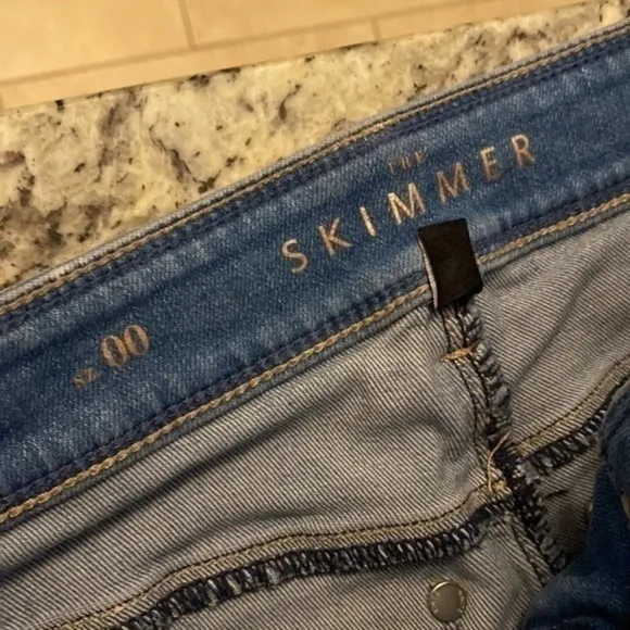 WHBM Light Wash Distressed Skimmer Jeans