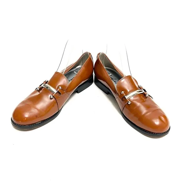 ZODIAC | Vintage 1990s men’s honey brown leather silver bar strap loafers